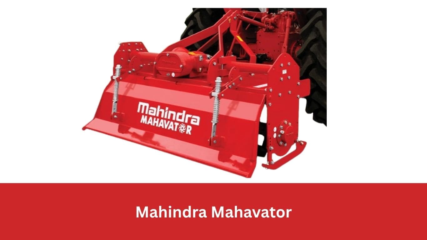 Mahindra Mahavator attachment connected to the tractor, operating in an Indian farm field during the harvesting season